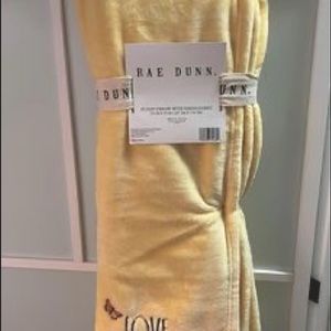 Beautiful Rae Dunn throw blanket.
